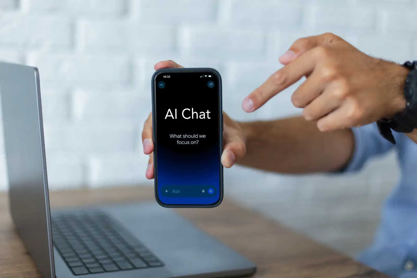 Team member using the YV Connect AI chat assistant on a phone